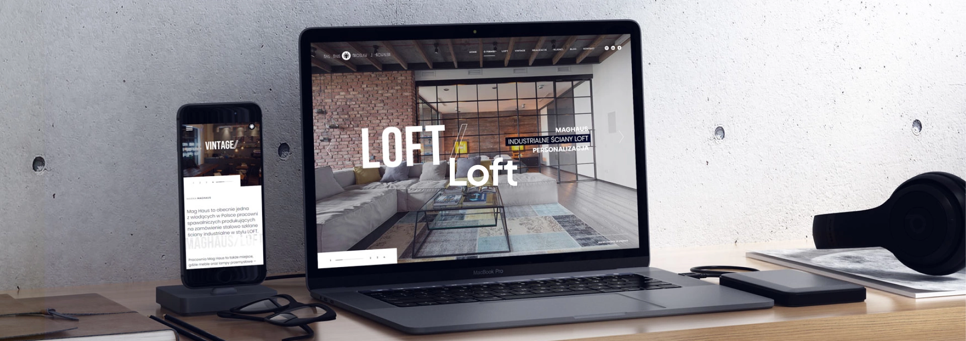 Strona Mag Haus prezentuje industrialne ściany loftowe. Laptop pokazuje wnętrze z przeszkloną ścianą, smartfon sekcję VINTAGE. Hasło: „Minimalizm – modernizm – Mag Haus”.