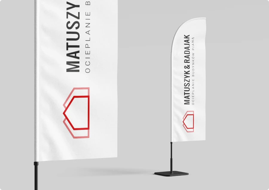Nowe logo Trazmet Lager Technik i Trazmet Logistics z odświeżoną typografią i kolorystyką. Czerwony akcent podkreśla technologię, a błękit transport i logistykę.